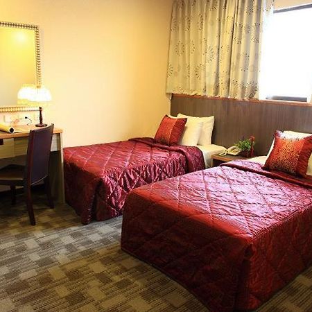 Huahou Hotel Kaohsiung Værelse billede